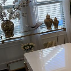 Acrylic mirrored bottom gold console