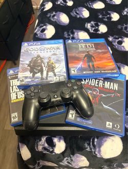 PS4 Console with Controller and 4 Games