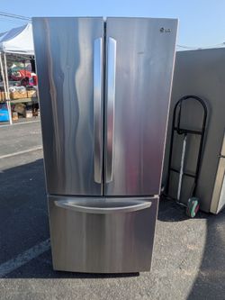 30" LG refrigerator/3 months of warranty and free local delivery