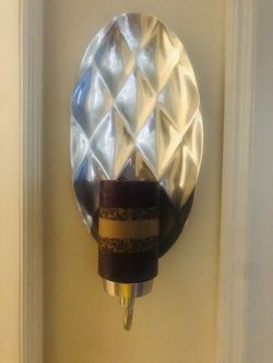 Silver candle holder wall sconce