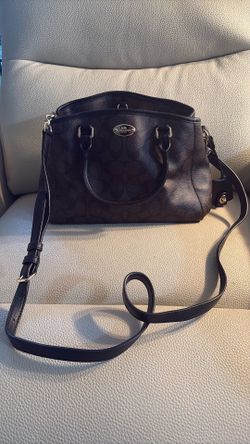 Black and brown coach purse