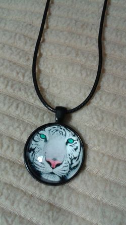 Tiger pendant, leather necklace