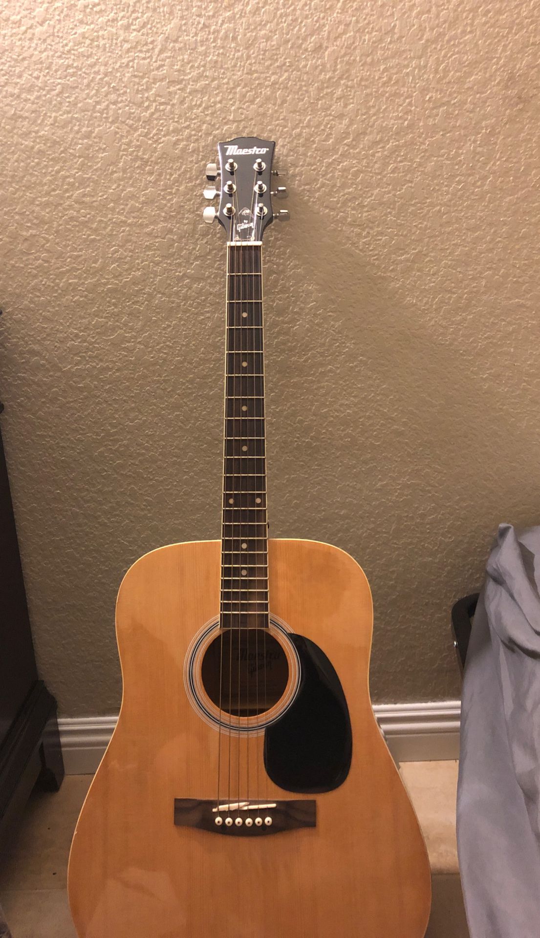 Maestro acoustic guitar with strings