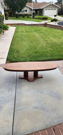 Vintage wooden surfboard table.
