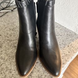 Women's dark leather cowboy-style boots