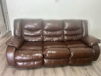 Brown leather recliner sofa