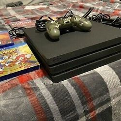 PS4 console With 2 Controllers And 3 Games.