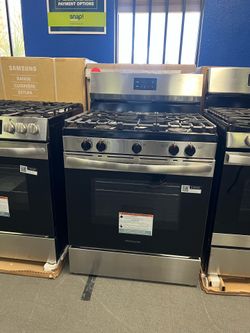 Frigidaire black and stainless steel range
