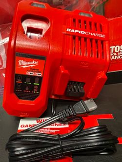 MILWAUKEE M18-M12  RAPID  CHARGER. NEW OUT THE BOX. NEVER USED   (( tool only))