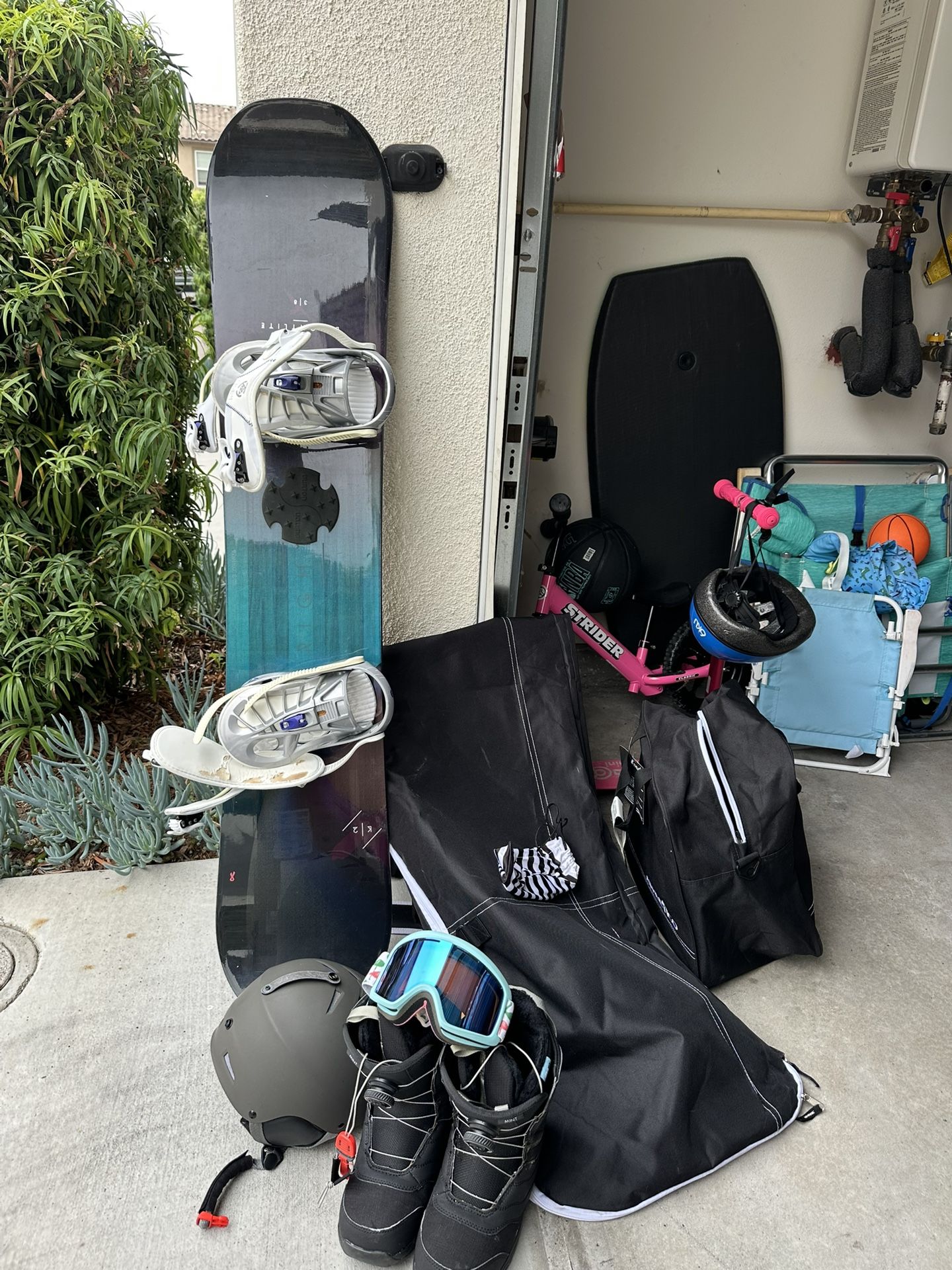 Snowboard + Boots + Travel Bags $150