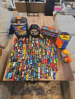 Approximately 180 hotwheels plus storage