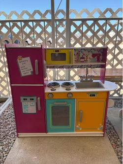 Cute KidKraft Wooden play kitchen