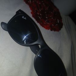 Black Ray-Ban sunglasses in good condition.