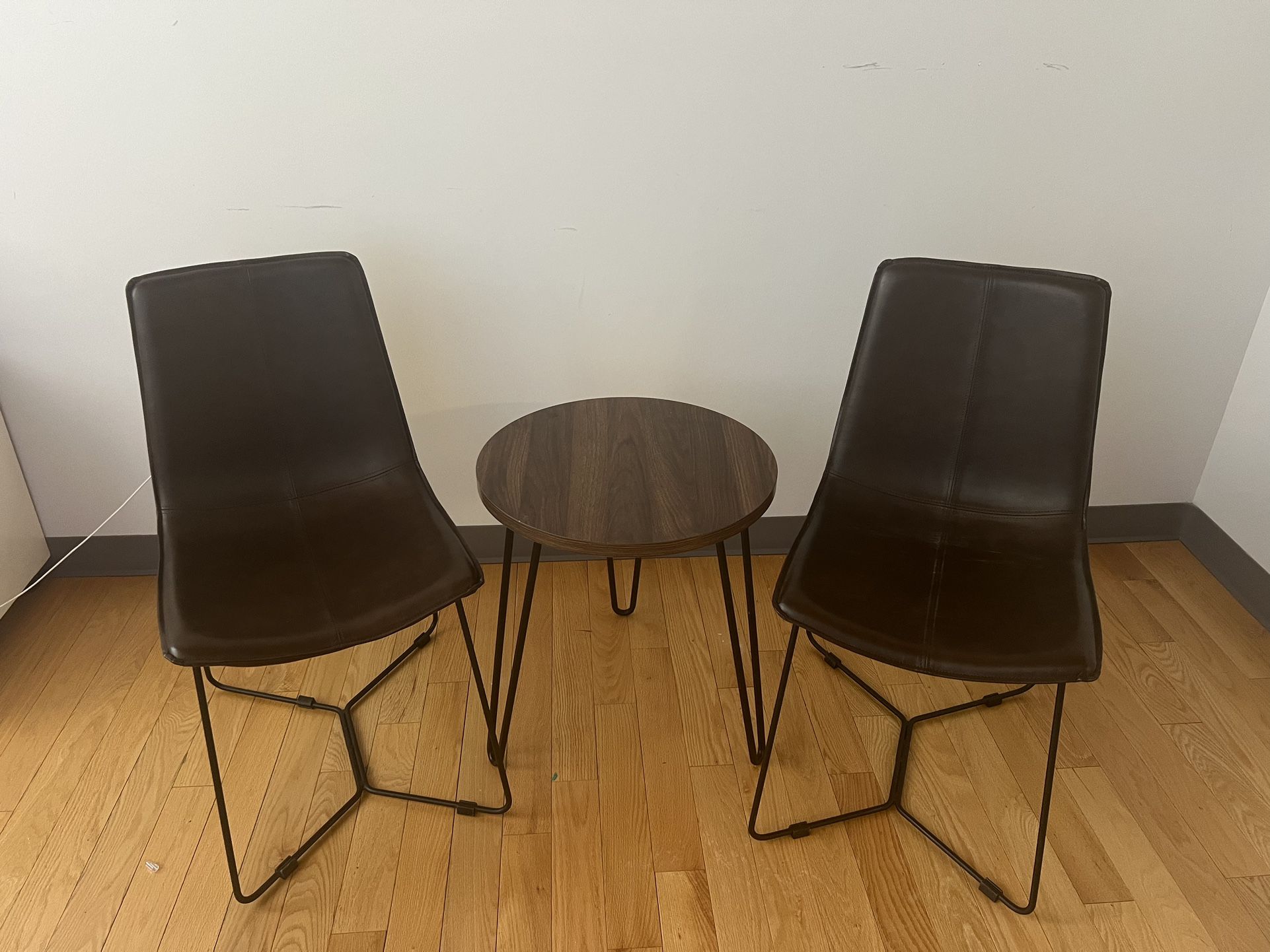 Set Of 2 Leather Chairs with Round Table. 