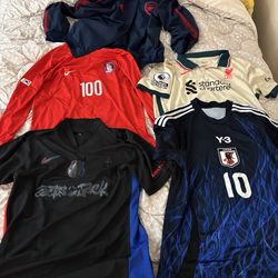 Bunch of soccer jersey and windbreaker
