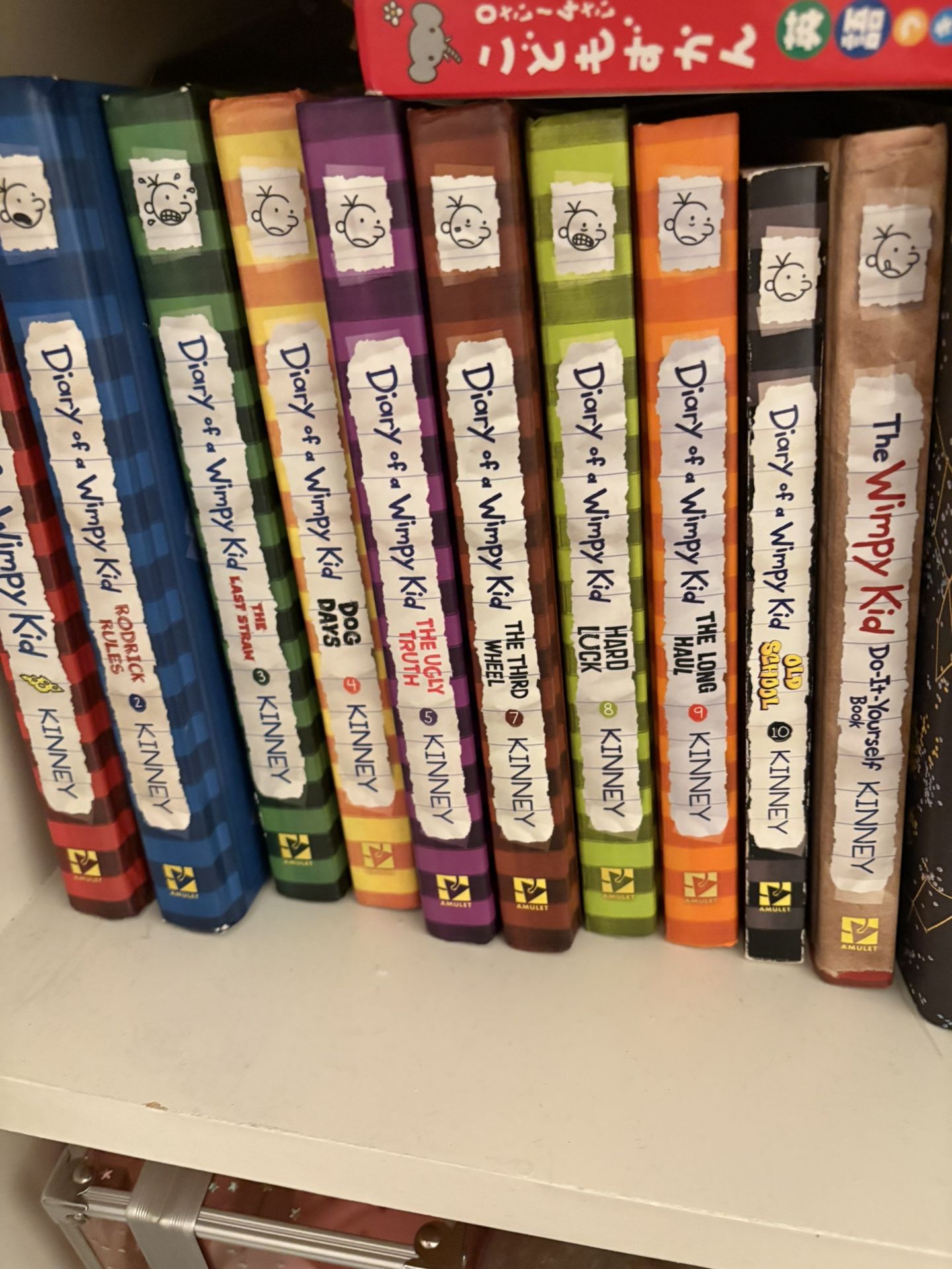 a collection of “Diary of the wimpy kid” hardcover books