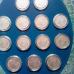 25 Silver Dollars Set $1375 