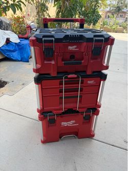 3 Milwaukee packout tool boxes like new only used 2 times rolling box and 3 drawers box asking $370
