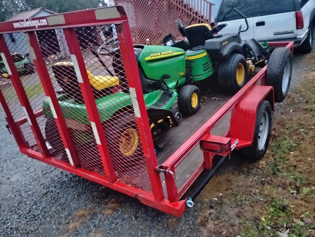 Zero Turn And Riding Mow And Trailer 
