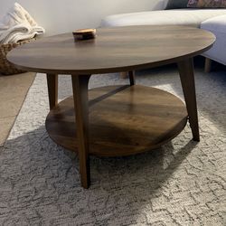 Brown round coffee table