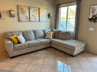 DELIVERY AVAILABLE 🚛! Beautiful beige sectional couch from Ashley Furniture