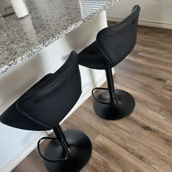 Adjustable Leather Bar Stools.
