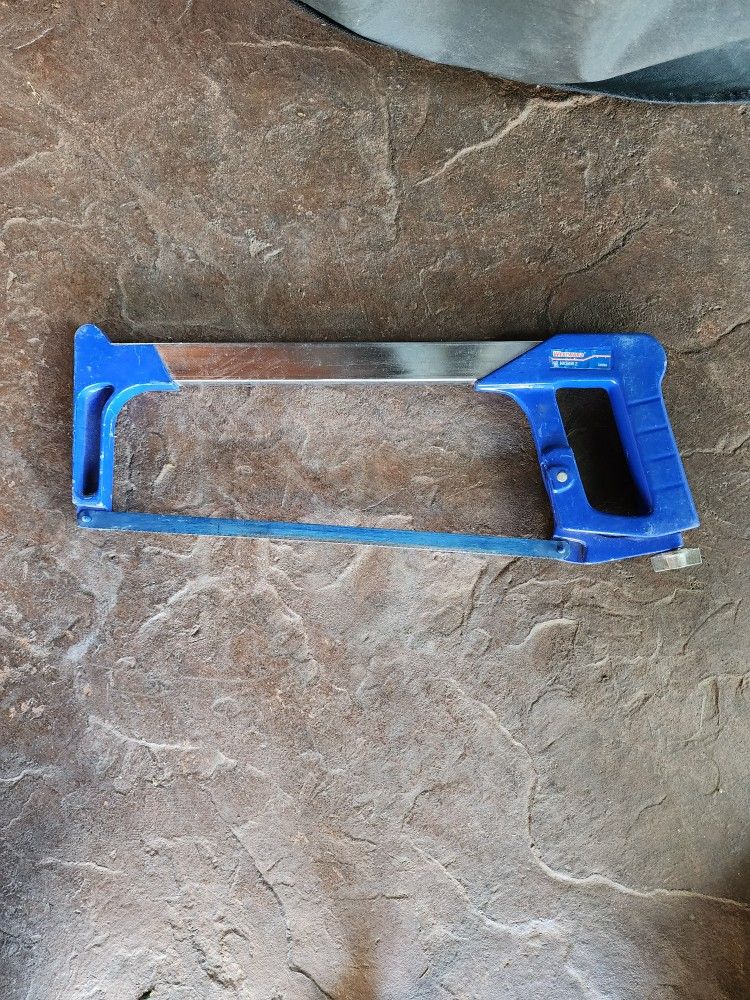 Durable hacksaw with a blue handle.