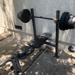 Weight Bench +bars and weights (250+lbs)