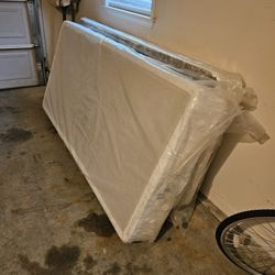 2 Twin Box Springs for a Kings size mattress still in it's original sealed plastic. Looks new.  78 1/2 length  x  38 1/2 height.