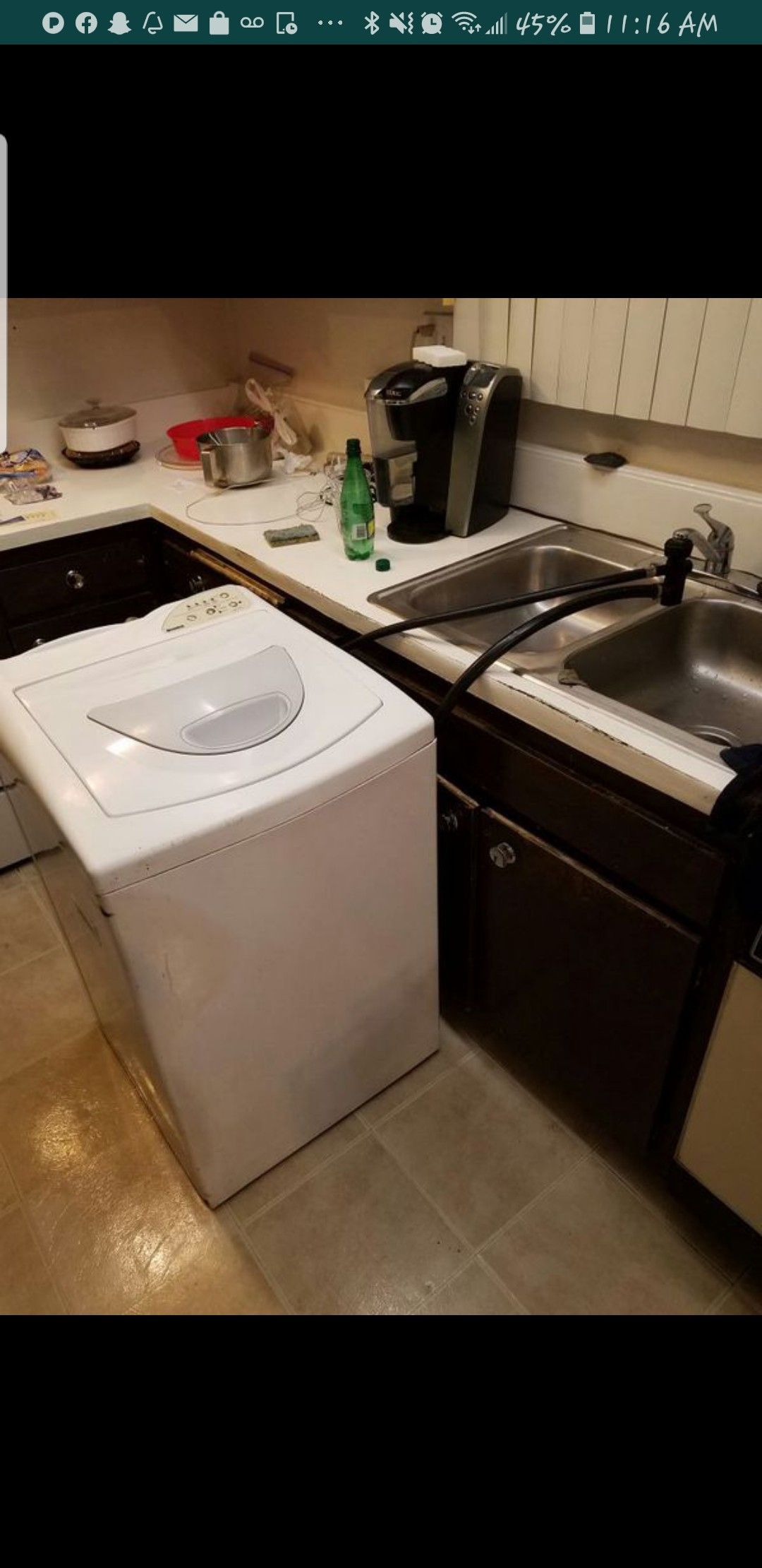 Kenmore apartment size washer on wheels. $50