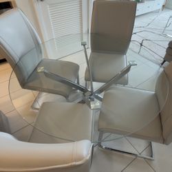 Modern Round Glass Dining Table with 4 Gray Chairs