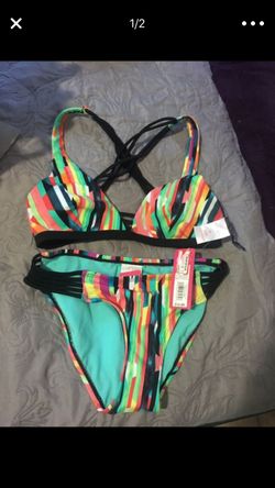 $10 (New) XS bathing suit, traje de baño