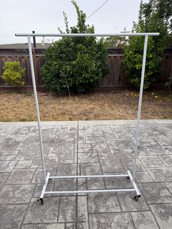 Clothing rack with wheels / rolling
