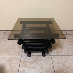 Vintage 1980's postmodern stacked tubular metal side tables with glass top