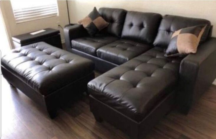 New in box espresso bonded leather sectional sofa// ottoman included