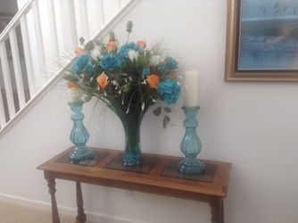Floral arrangement, vase , candle holders and candles with timers!