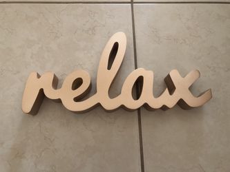 Gold “relax” Decor Piece
