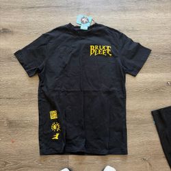 Bruce Lee yellow and black shirts size S