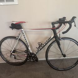 Cannondale Super Six Road bike W/ A Fully Carbon Frame And Fork 