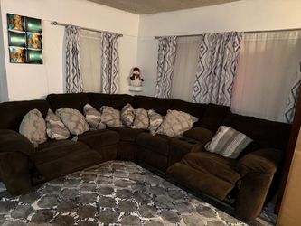 reclining sectional sofa brown 5 seats and 2 cups holder console