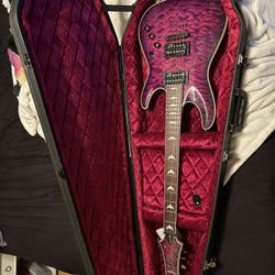 Schecter Omen Extreme 6 -Magenta W/ Coffin Case
