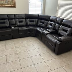 New Reclining Sectional .  Brown Gel Leatherette .  106” X 106”.  Free Delivery !