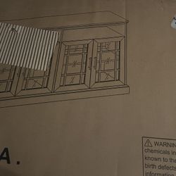 Tv Stand New In Box ( Indent on Wood) 