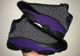 purple and black jordan 13’s