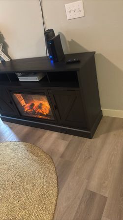 tv stand with fireplace