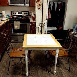 (29.5"x29.5") Square Tile And Wood kitchen Table And 3 Wood And Wrought Iron Chairs