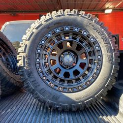 20x10 Wheels And Tires 33/1250/20 MT