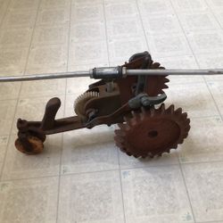 Vintage cast-iron tractor lawn sprinkler