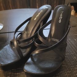 Bebe sandals wedge heels,LEATHER made In BRAZIL,size 8 it comes with a FREE pair of Steve Madden leather booties Size 8