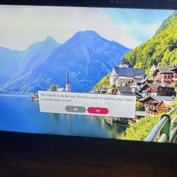 LG 60” Smart 4K See Pictures Corner Cracked 